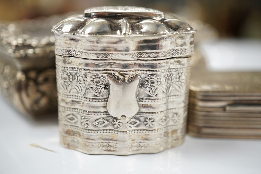 A George IV silver snuff box, by Nathaniel Mills (a.f.), Birmingham, 1827, 84mm, a Dutch white metal pill box and a Portuguese white metal snuff box. Condition - poor to fair